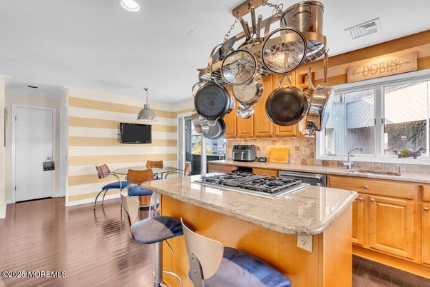 Dining room, Interior, Kitchen, Recessed Lighting, Stainless Steel Appliances, Wood Texture Flooring