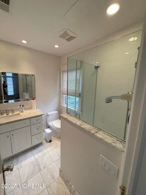Bathroom, Dual Sink Vanities, Glass Shower, Interior, Marble, Recessed Lighting