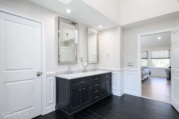 Bathroom, Dual Sink Vanities, Interior, Recessed Lighting, Wood Texture Flooring