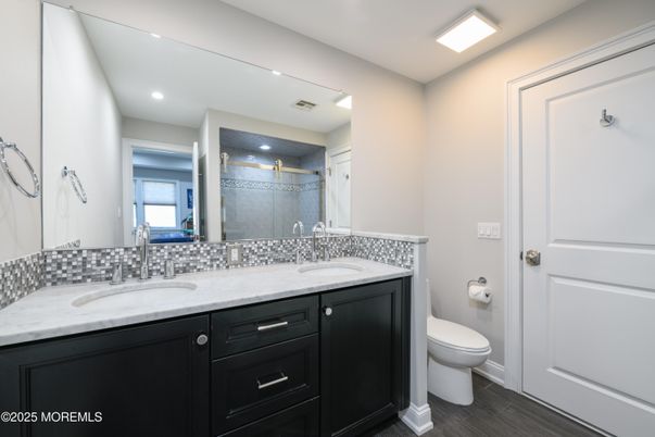 Bathroom, Dual Sink Vanities, Interior, Recessed Lighting, Wood Texture Flooring