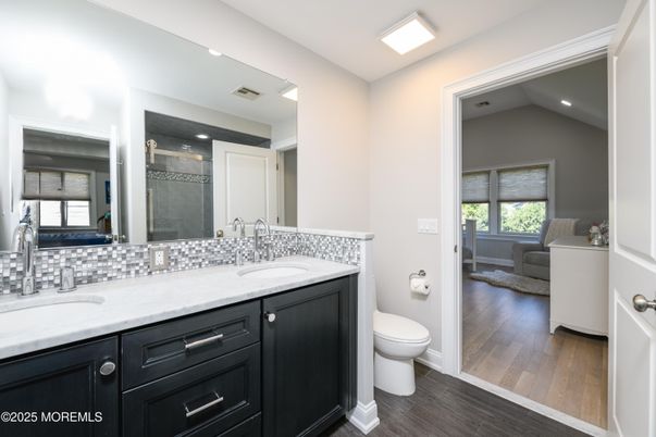 Bathroom, Dual Sink Vanities, Interior, Recessed Lighting, Wood Texture Flooring
