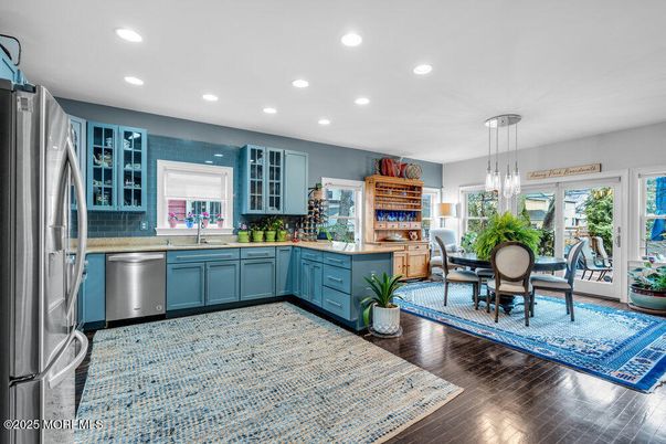 Dining room, Interior, Kitchen, Pendant Lights, Recessed Lighting, Stainless Steel Appliances, Wood Texture Flooring