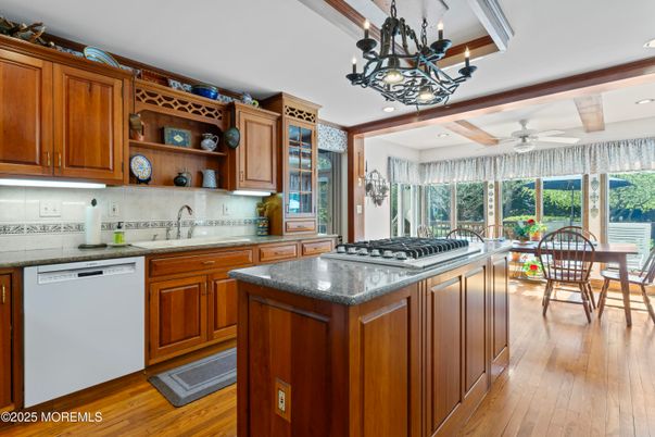 Chandelier, Dining room, Interior, Kitchen, Recessed Lighting, Stainless Steel Appliances, Wood Texture Flooring