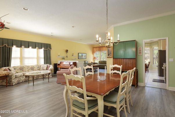 Chandelier, Dining room, Interior, Living room, Piano, Recessed Lighting, Wood Texture Flooring