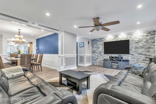 Dining room, Interior, Living room, Recessed Lighting, Stone Walls, Wood Texture Flooring