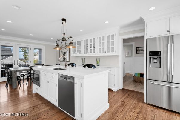 Dining room, Interior, Kitchen, Pendant Lights, Recessed Lighting, Stainless Steel Appliances, Wood Texture Flooring
