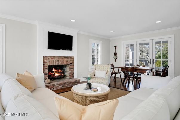 Dining room, Fireplace, Interior, Living room, Recessed Lighting, Wood Texture Flooring