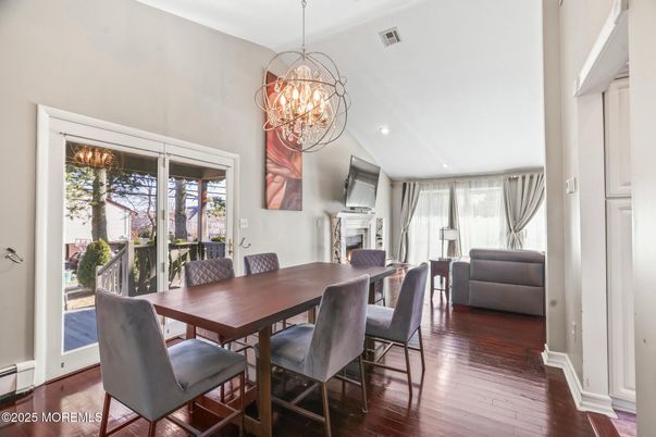 Chandelier, Dining room, Fireplace, Interior, Recessed Lighting, Wood Texture Flooring