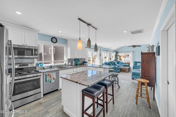 Interior, Kitchen, Pendant Lights, Recessed Lighting, Stainless Steel Appliances, Wood Texture Flooring