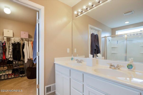 Bathroom, Dual Sink Vanities, Glass Shower, Interior, Recessed Lighting, Walk-in Closets