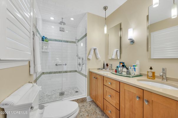 Bathroom, Dual Sink Vanities, Glass Shower, Interior, Pendant Lights, Recessed Lighting
