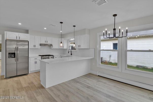 Interior, Kitchen, Pendant Lights, Recessed Lighting, Stainless Steel Appliances, Wood Texture Flooring
