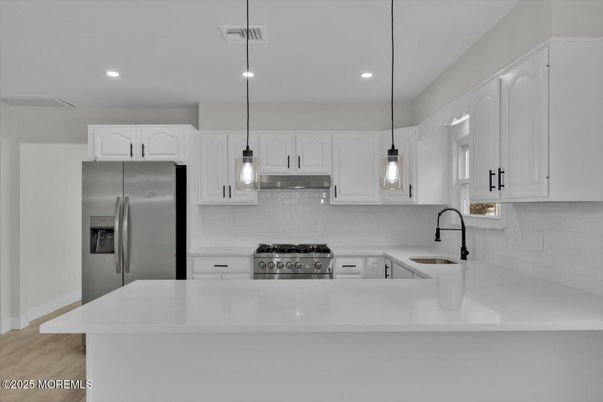 Interior, Kitchen, Pendant Lights, Recessed Lighting, Stainless Steel Appliances, Wood Texture Flooring