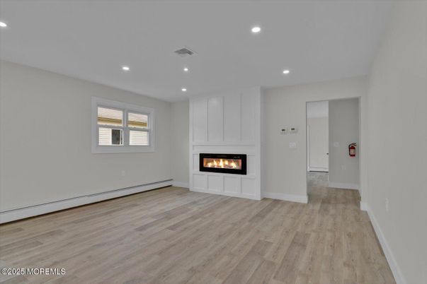 Empty room, Fireplace, Interior, Recessed Lighting, Wood Texture Flooring