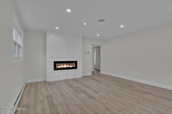 Empty room, Fireplace, Interior, Recessed Lighting, Wood Texture Flooring
