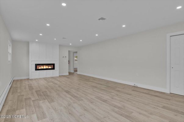 Empty room, Fireplace, Interior, Recessed Lighting, Wood Texture Flooring