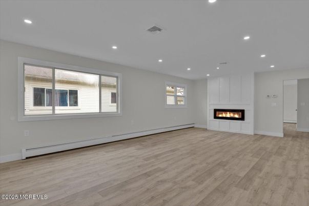 Empty room, Fireplace, Interior, Recessed Lighting, Wood Texture Flooring