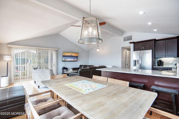 Dining room, Interior, Kitchen, Living room, Pendant Lights, Recessed Lighting, Stainless Steel Appliances, Wood Texture Flooring