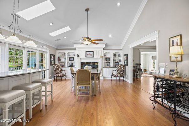 Dining room, Fireplace, Interior, Pendant Lights, Recessed Lighting, Wood Texture Flooring