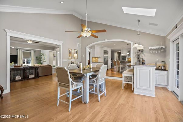 Dining room, Interior, Kitchen, Pendant Lights, Recessed Lighting, Stainless Steel Appliances, Wood Texture Flooring
