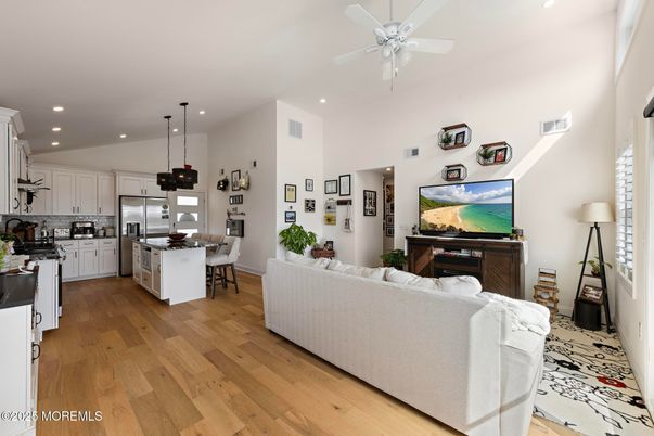 Dining room, Interior, Kitchen, Living room, Pendant Lights, Recessed Lighting, Stainless Steel Appliances, Wood Texture Flooring