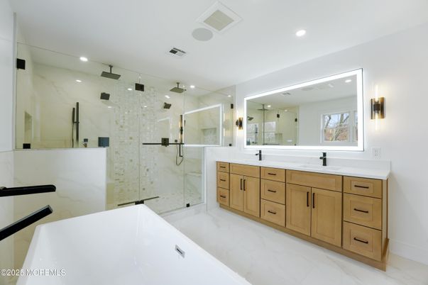Bathroom, Dual Sink Vanities, Glass Shower, Interior, Marble, Marble Walls, Recessed Lighting