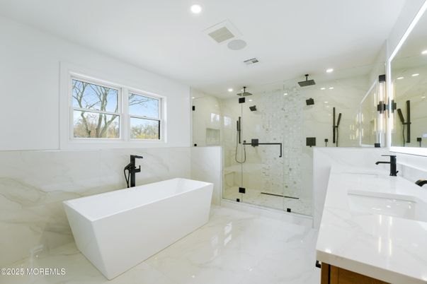 Bathroom, Dual Sink Vanities, Free Standing Baths, Glass Shower, Interior, Marble, Marble Walls, Recessed Lighting