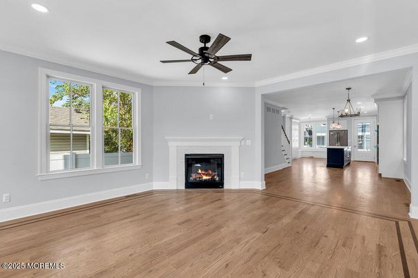 Empty room, Fireplace, Interior, Pendant Lights, Recessed Lighting, Wood Texture Flooring