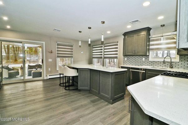 Interior, Kitchen, Pendant Lights, Recessed Lighting, Stainless Steel Appliances, Wood Texture Flooring