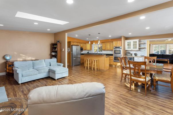 Dining room, Interior, Kitchen, Living room, Recessed Lighting, Stainless Steel Appliances, Wood Texture Flooring