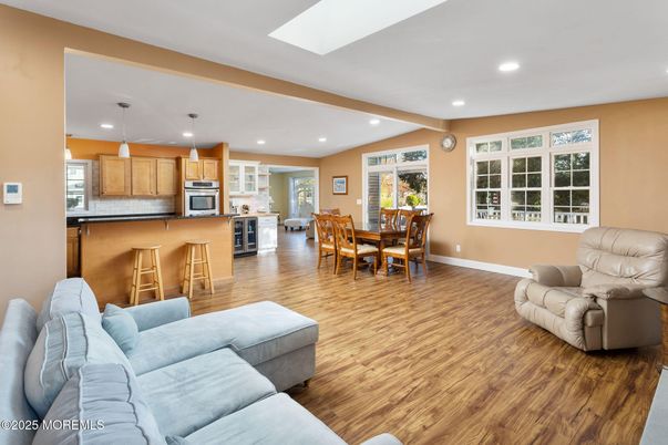 Dining room, Interior, Kitchen, Living room, Pendant Lights, Recessed Lighting, Stainless Steel Appliances, Wood Texture Flooring