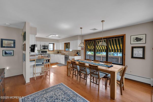 Dining room, Interior, Kitchen, Pendant Lights, Stainless Steel Appliances, Wood Texture Flooring