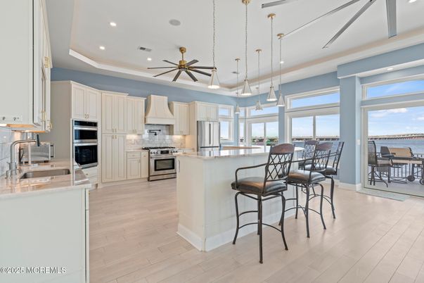 Interior, Kitchen, Pendant Lights, Recessed Lighting, Stainless Steel Appliances, Water, Wood Texture Flooring