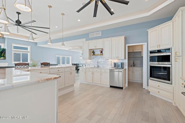 Interior, Kitchen, Pendant Lights, Recessed Lighting, Stainless Steel Appliances, Wood Texture Flooring
