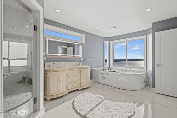 Bathroom, Dual Sink Vanities, Glass Shower, Interior, Marble, Recessed Lighting, Water