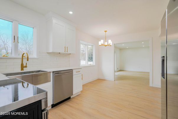 Chandelier, Interior, Kitchen, Pendant Lights, Recessed Lighting, Stainless Steel Appliances, Wood Texture Flooring