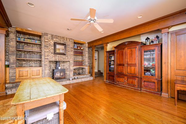 Fireplace, Interior, Recessed Lighting, Stone Walls, Wood Texture Flooring
