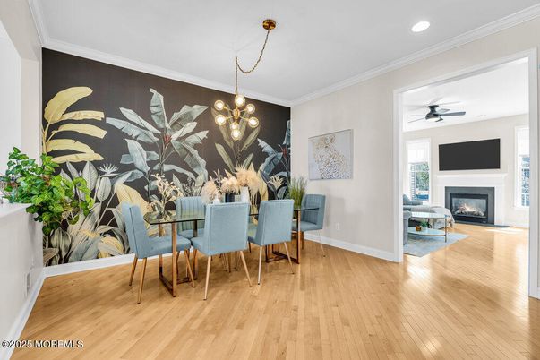 Dining room, Fireplace, Interior, Pendant Lights, Recessed Lighting, Wood Texture Flooring