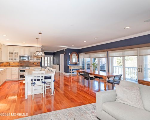 Dining room, Interior, Kitchen, Pendant Lights, Recessed Lighting, Stainless Steel Appliances, Wood Texture Flooring