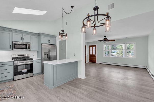 Interior, Kitchen, Pendant Lights, Stainless Steel Appliances, Wood Texture Flooring