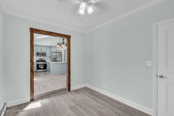Empty room, Interior, Kitchen, Stainless Steel Appliances, Wood Texture Flooring