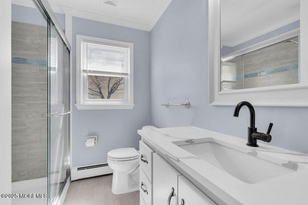 Bathroom, Dual Sink Vanities, Glass Shower, Interior, Wood Texture Flooring