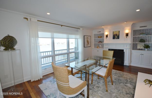 Dining room, Fireplace, Interior, Recessed Lighting, Wood Texture Flooring