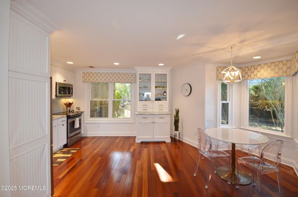 Dining room, Interior, Kitchen, Pendant Lights, Recessed Lighting, Stainless Steel Appliances, Wood Texture Flooring