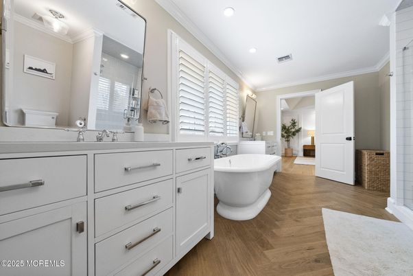Bathroom, Dual Sink Vanities, Free Standing Baths, Interior, Recessed Lighting, Wood Texture Flooring
