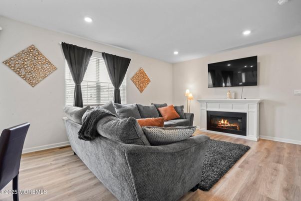 Fireplace, Interior, Living room, Recessed Lighting, Wood Texture Flooring