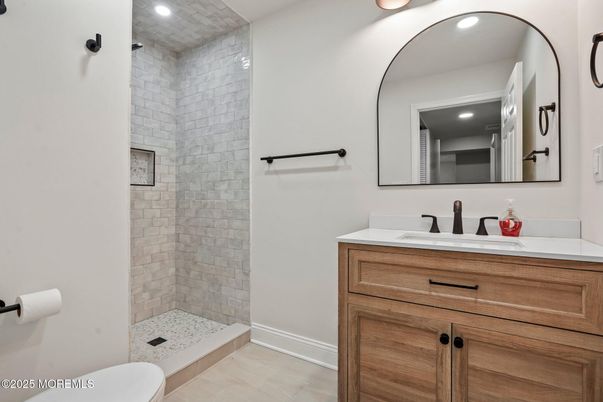 Bathroom, Dual Sink Vanities, Interior, Recessed Lighting, Stone Walls