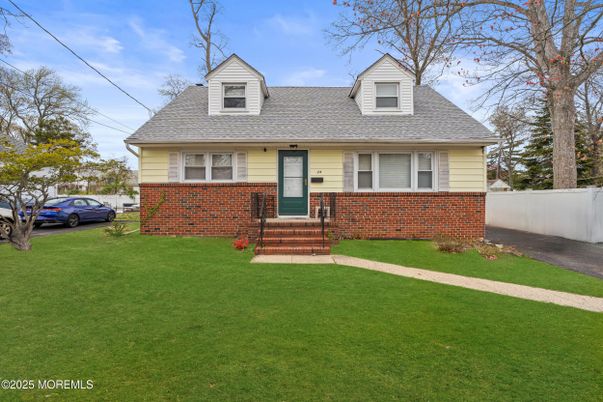 Exterior, Facade, Brick Facade, Cape Cod