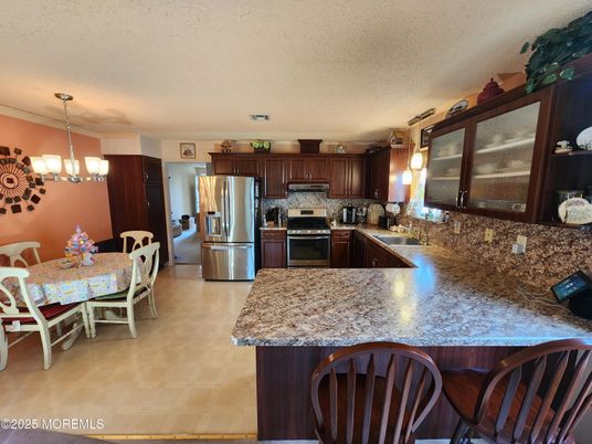 Chandelier, Dining room, Interior, Kitchen, Pendant Lights, Stainless Steel Appliances