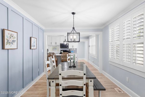 Dining room, Interior, Kitchen, Pendant Lights, Stainless Steel Appliances, Wood Texture Flooring